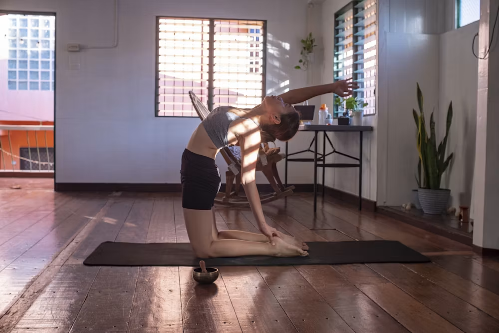 Adult stretching before a light workout at home